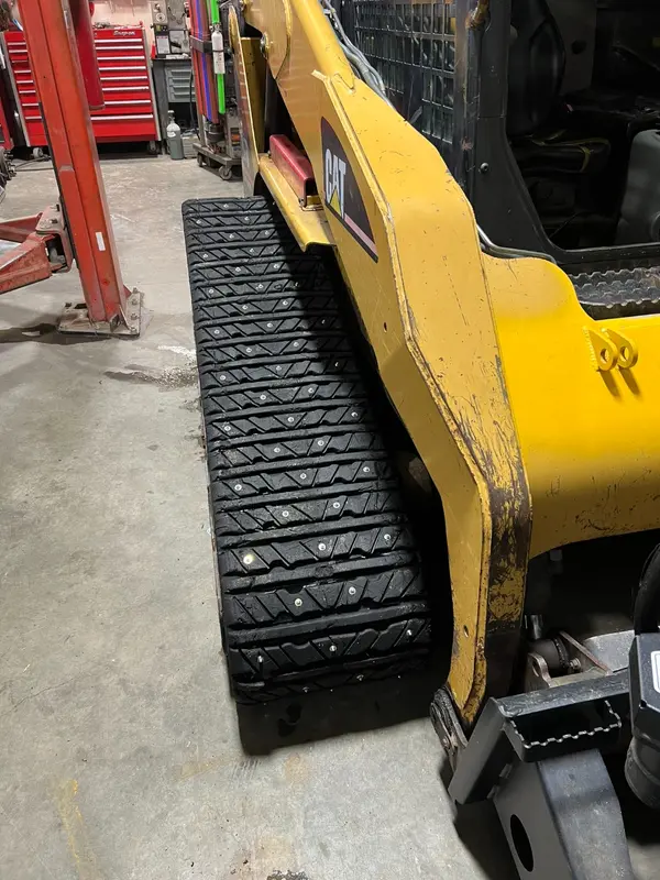 How Tight Should Your Skid Steer Track Studs Be?