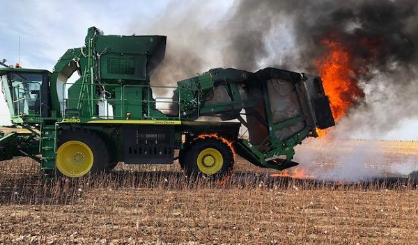 What Is the Purpose of the Water System on a Cotton Harvester?